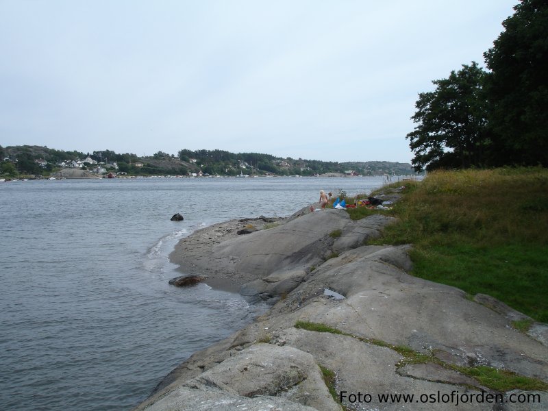 Liten sandstrand Havna badeplass